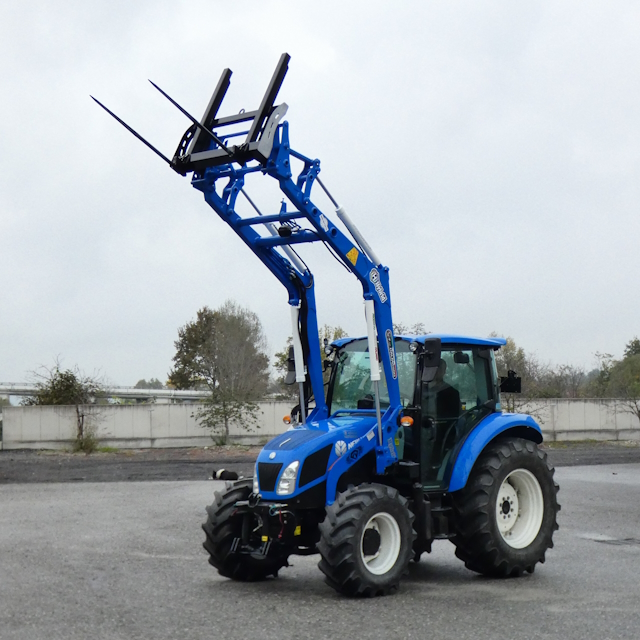 Caricatore frontale hybrid dalmasso con forca su new holland